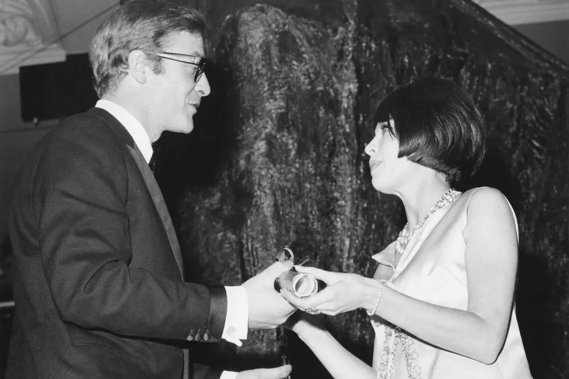 MICHAEL CAINE and LESLIE CARON