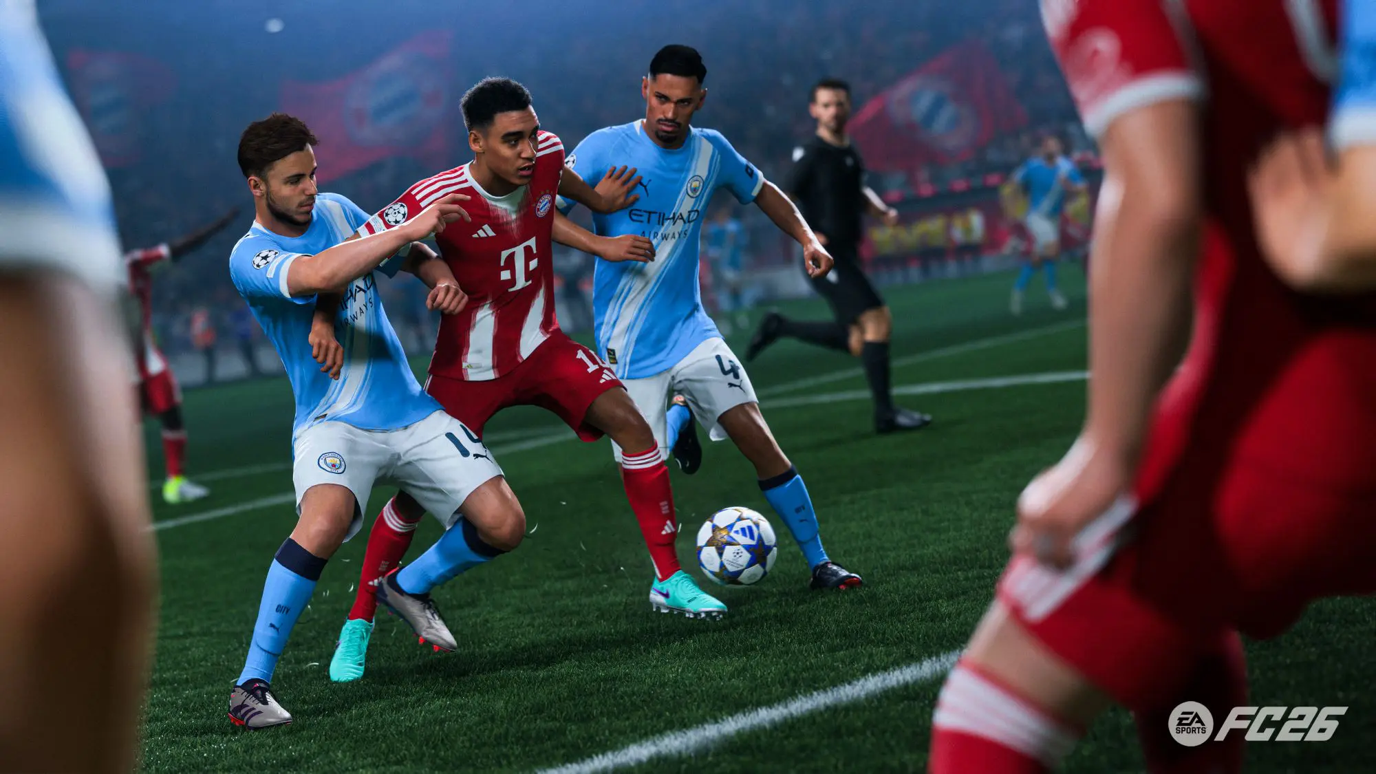 A still from the game EA SPORTS FC 26. Two footballers in blue try to tackle a footballer in red while a referee looks on.