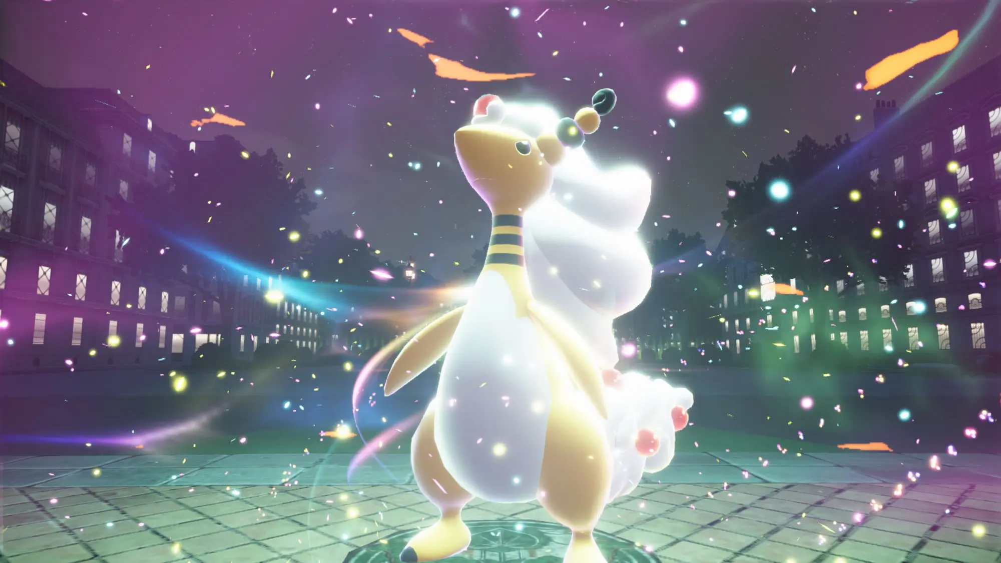 A still from the game Pokémon Legends Z-A. A yellow Pokémon with a long neck with black rings around it and a glowing white cloud coming out of it's back. It is surrounded by bright magical looking lights.